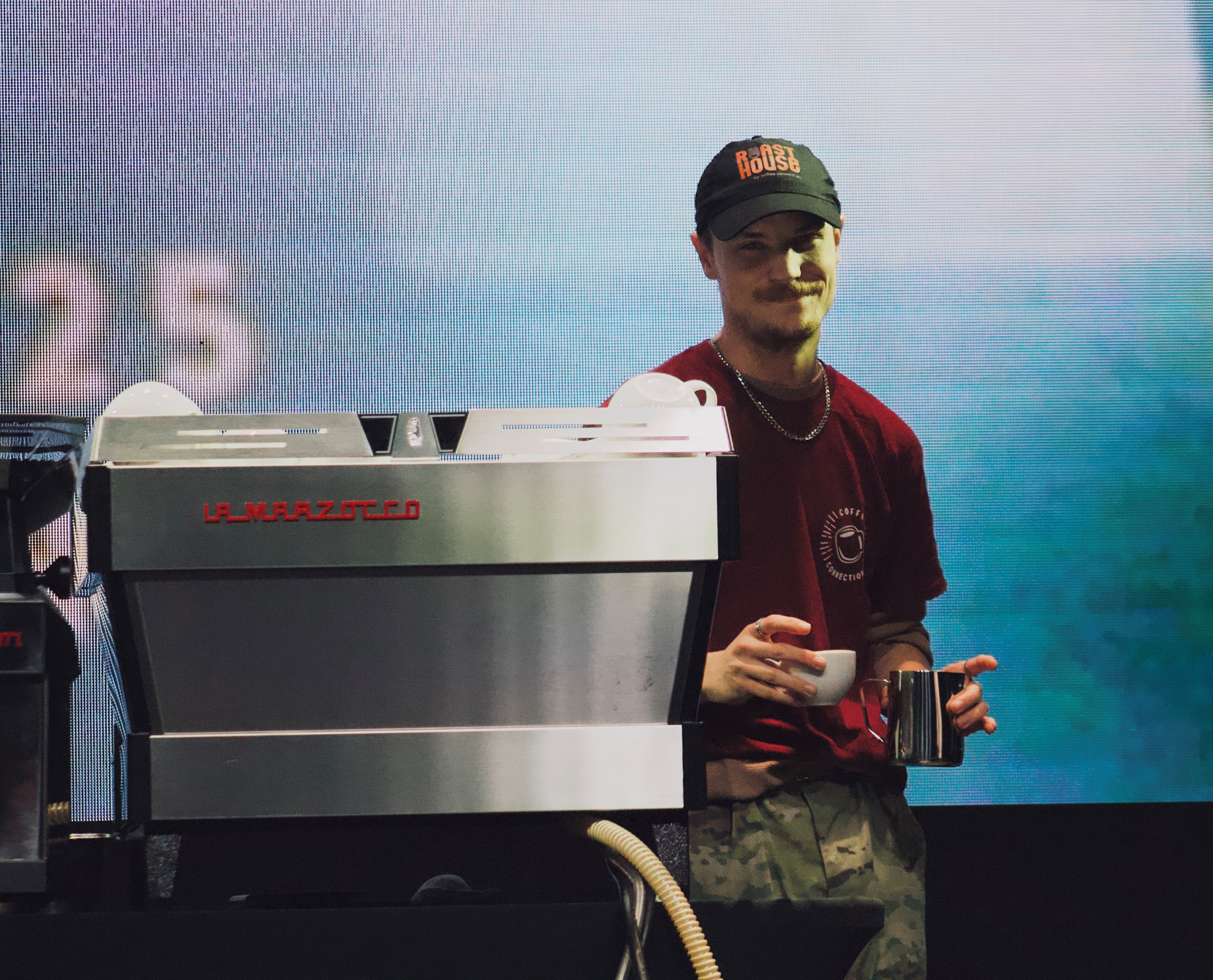 Samuel North behind the espresso bar